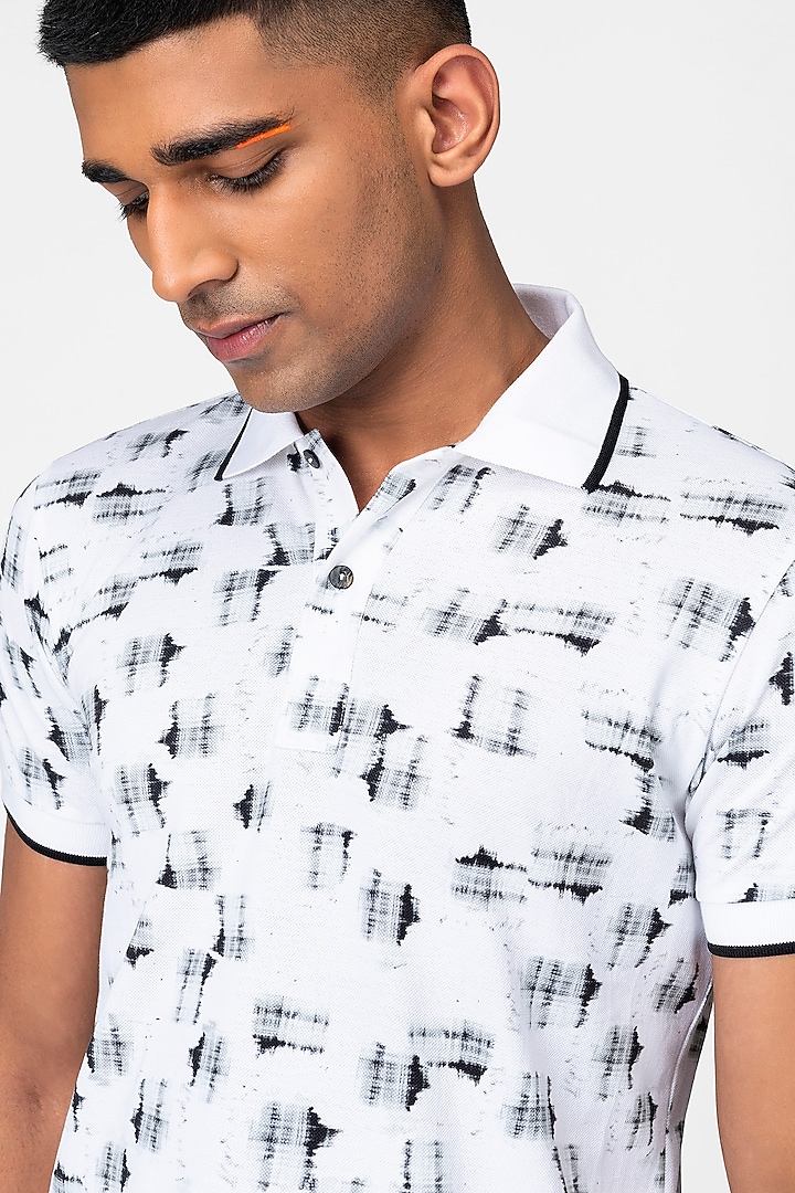 Black & White Checkered Polo T-Shirt by Genes Lecoanet Hemant Men at Pernia's Pop Up Shop