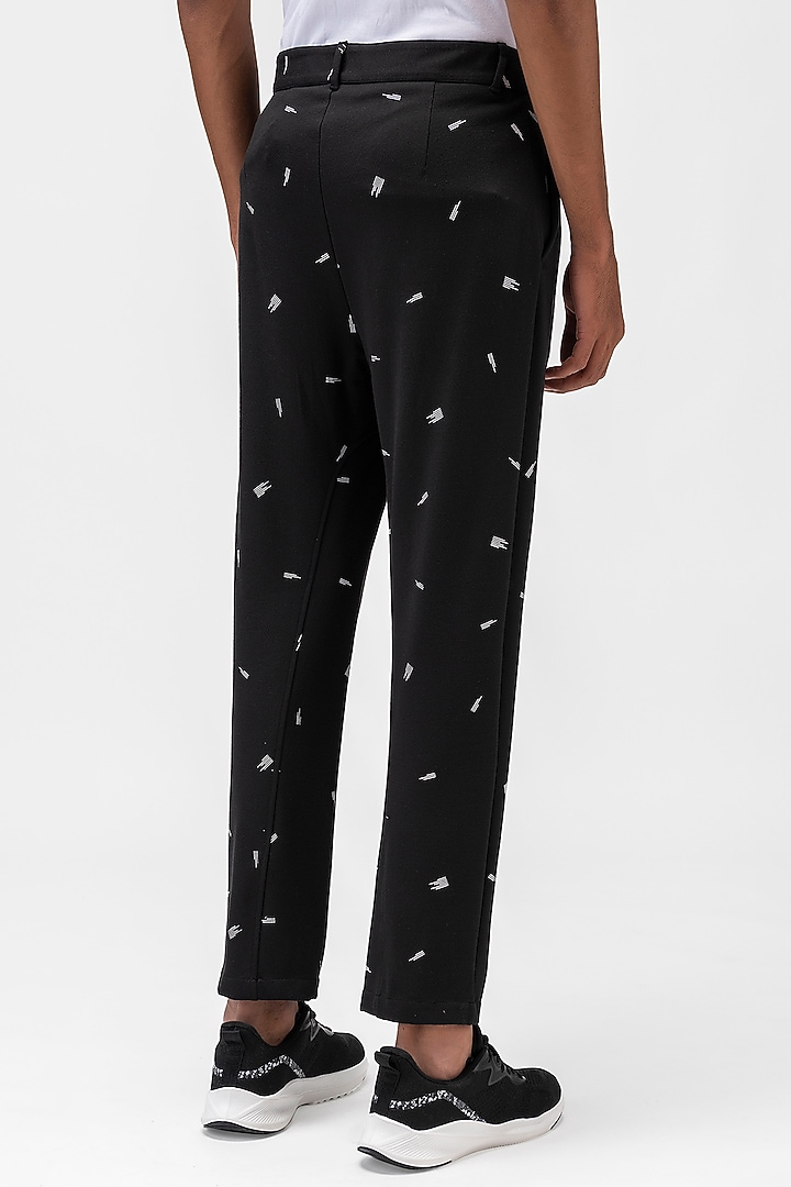 Black Double Jersey Printed Joggers by Genes Lecoanet Hemant Men at Pernia's Pop Up Shop