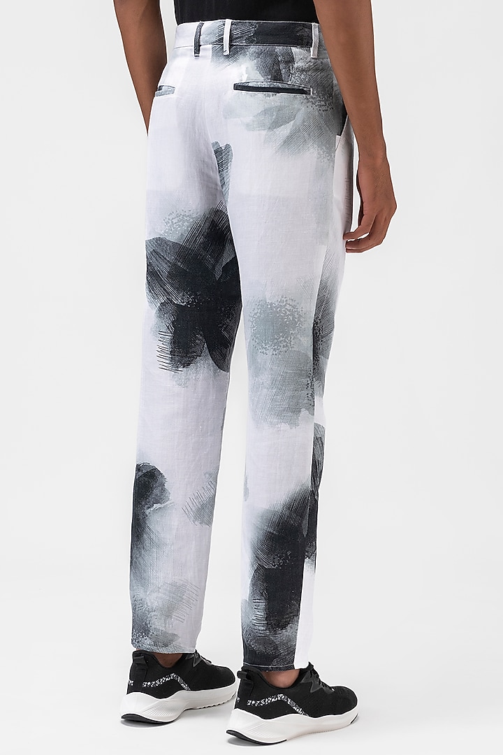 White Linen Herringbone Printed Trousers by Genes Lecoanet Hemant Men at Pernia's Pop Up Shop