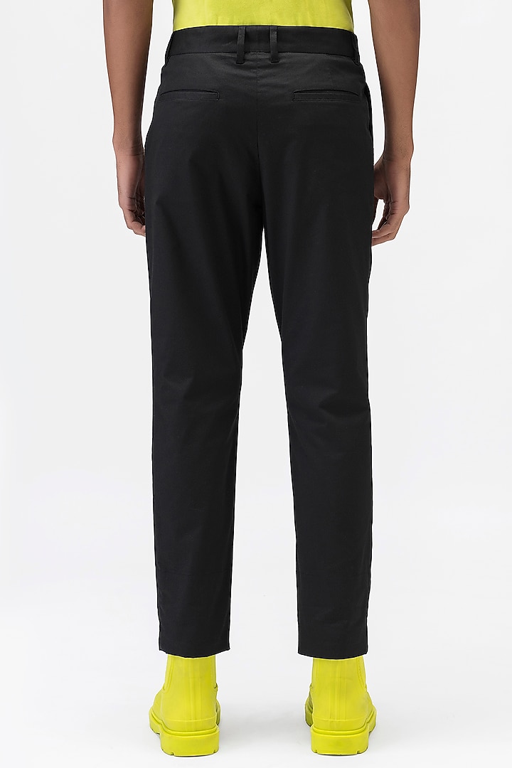 Black Cotton Twill Printed Trousers by Genes Lecoanet Hemant Men at Pernia's Pop Up Shop