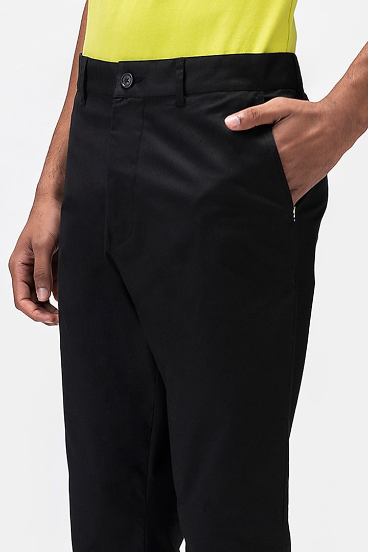 Black Cotton Twill Printed Trousers by Genes Lecoanet Hemant Men at Pernia's Pop Up Shop