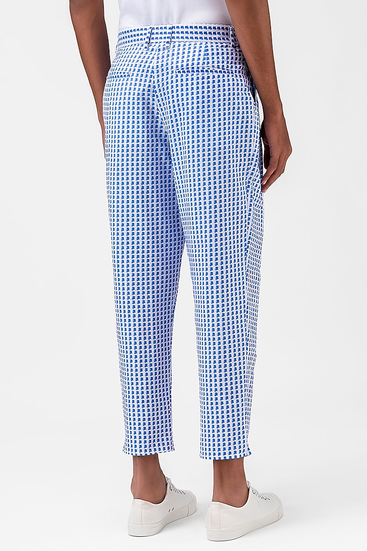 White & Blue Cotton Poplin Printed Trousers by Genes Lecoanet Hemant Men at Pernia's Pop Up Shop