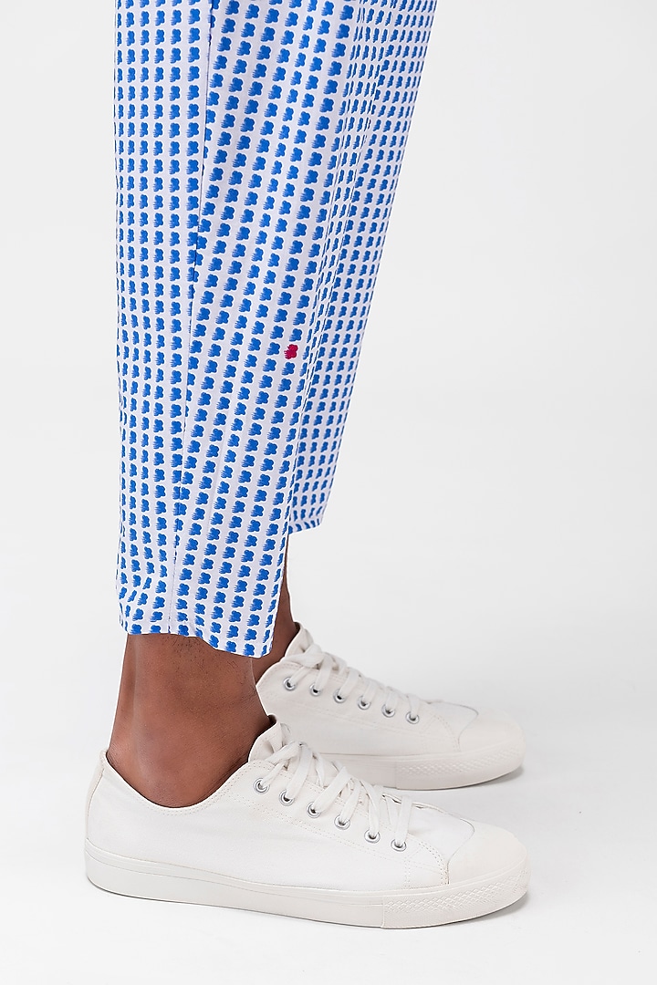 White & Blue Cotton Poplin Printed Trousers by Genes Lecoanet Hemant Men at Pernia's Pop Up Shop