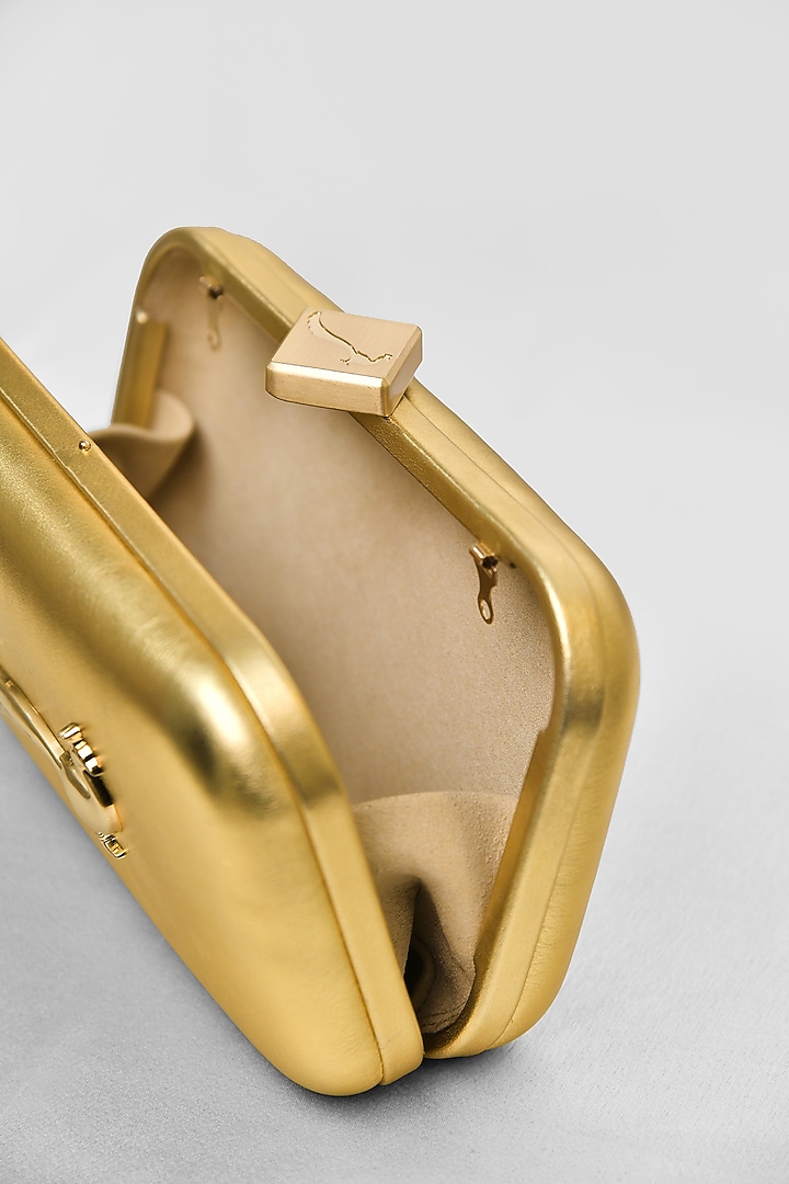 Gold Leather Flapover Cross Body Bag by GLA Accessories at Pernia's Pop Up Shop