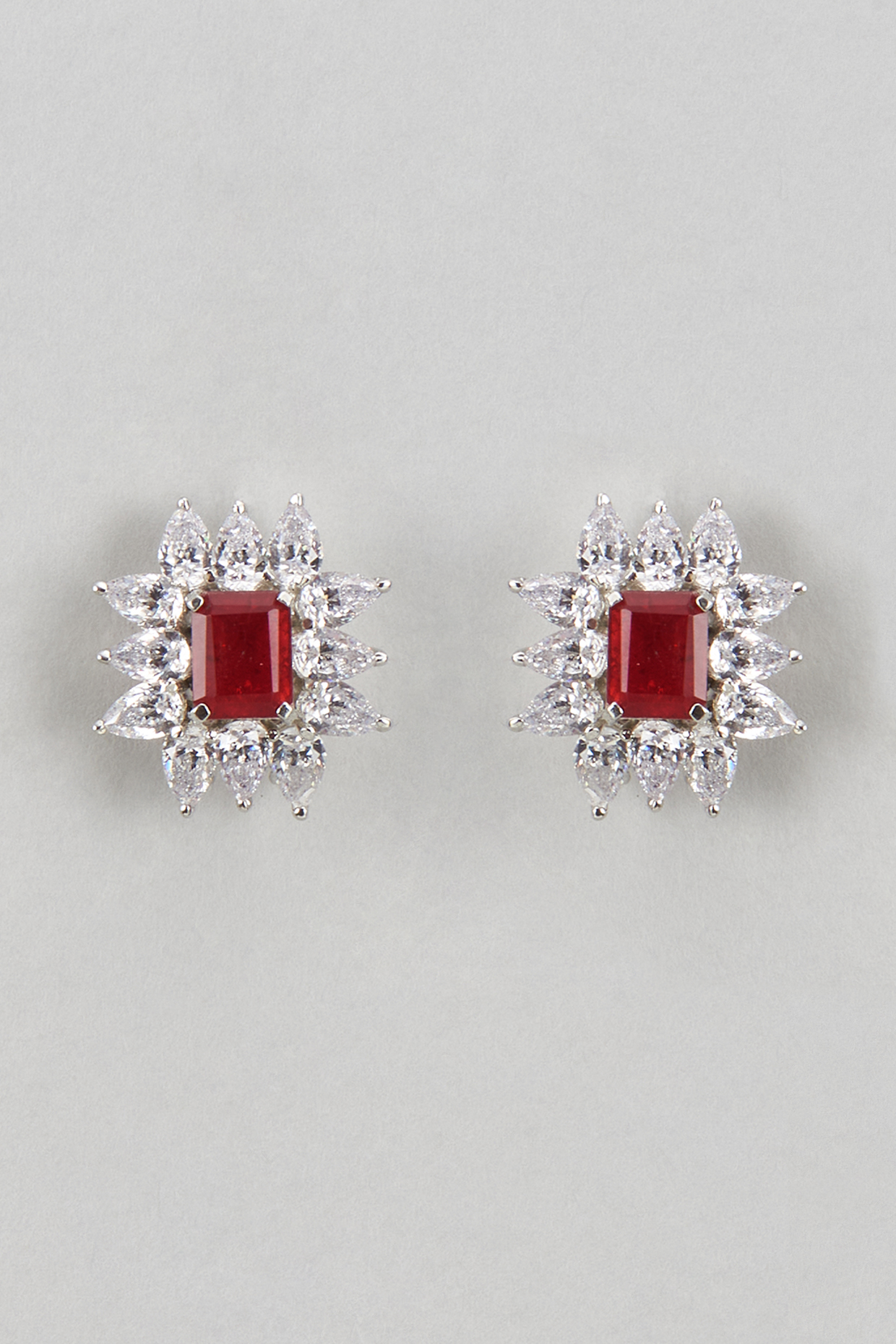 White Finish Zircon & Ruby Stone Stud Earrings by GN SPARKLE at Pernia's Pop Up Shop