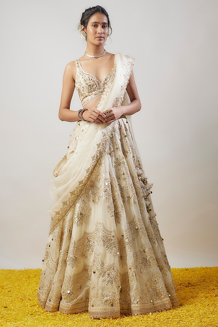 Ivory Tussar Hand & Machine Embellished Bridal Lehenga Set by GOPI VAID at Pernia's Pop Up Shop