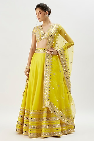 Yellow Tussar Mirror Embroidered Lehenga Set by GOPI VAID