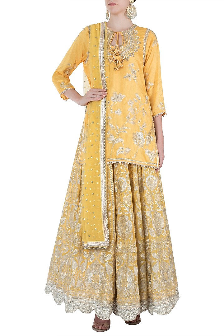 Yellow embroidered kurta with lehenga skirt set available only at Pernia's Pop Up Shop.