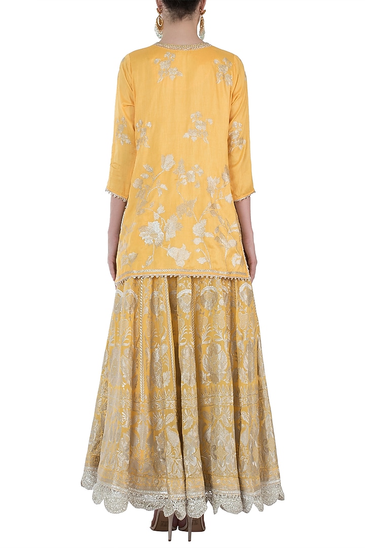 Yellow embroidered kurta with lehenga skirt set available only at Pernia's Pop Up Shop.