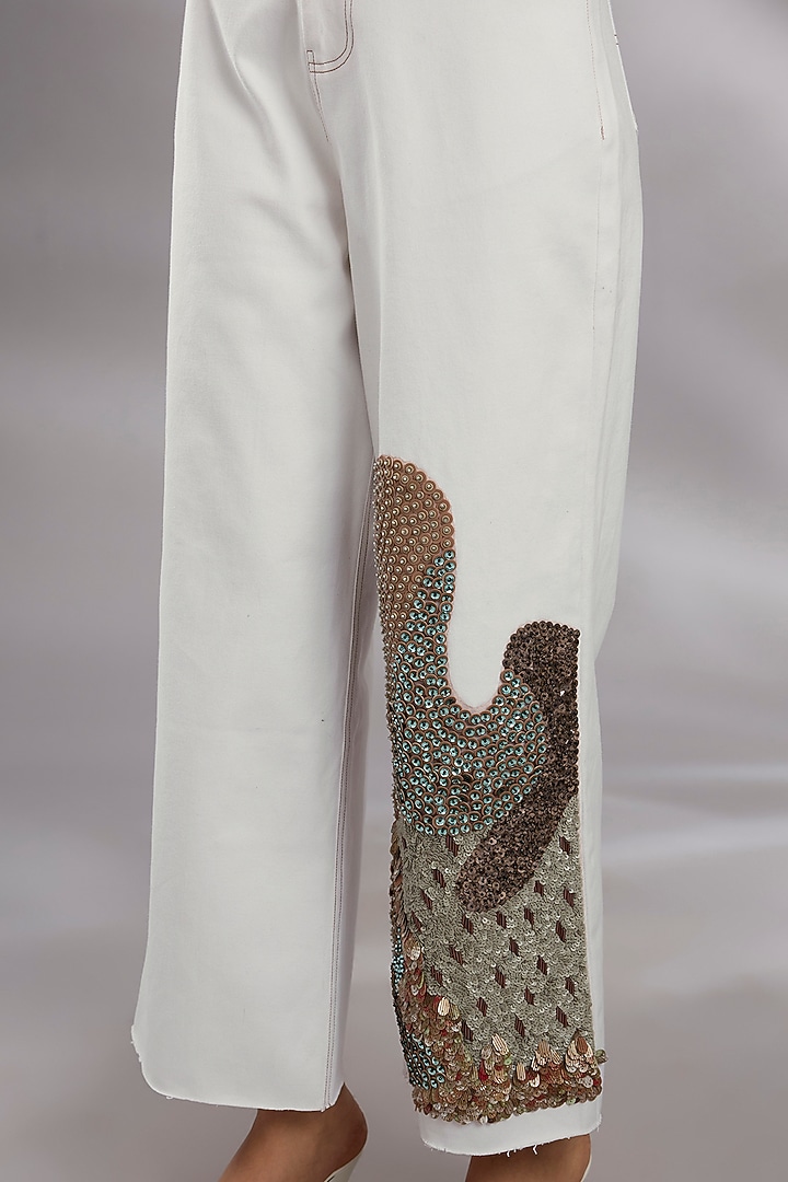 White Denim Sequin Embroidered High-Waisted Trousers by GRAINE at Pernia's Pop Up Shop