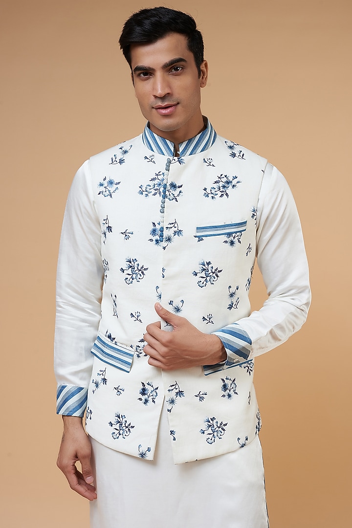 White Khadi Cotton & Linen Satin Floral Embroidered Bundi Jacket by HANEET SINGH at Pernia's Pop Up Shop
