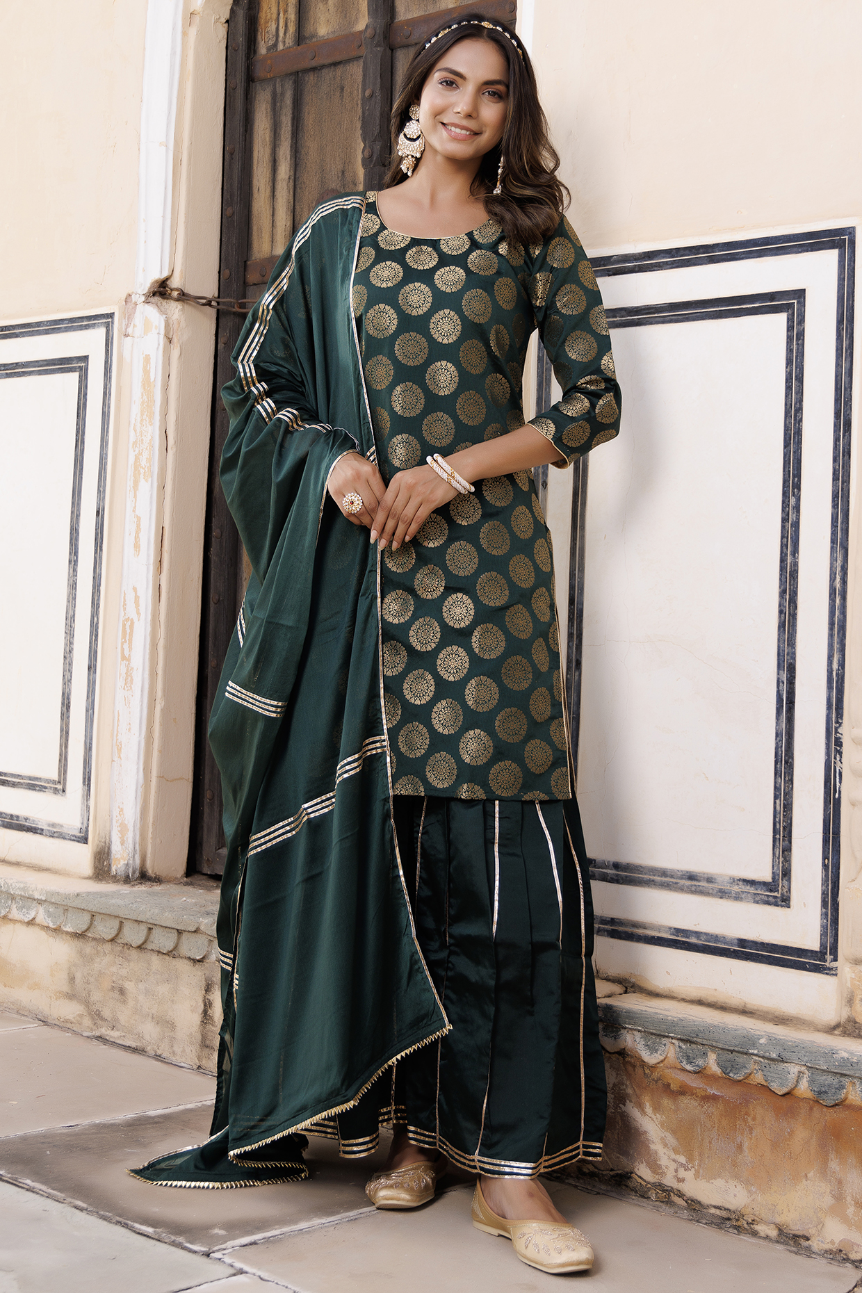 Green Banarasi Silk Gota Hand Embellished Sharara Set by Geroo Jaipur at Pernia's Pop Up Shop