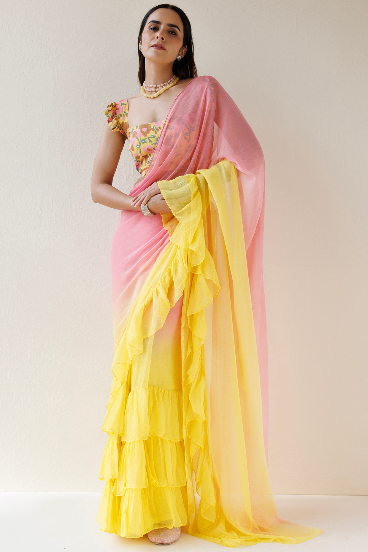 Yellow and pink color hand bandhej silk saree with zari weaving work