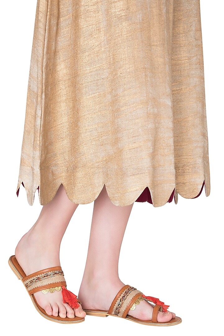 Tan tassel sandals available only at Pernia's Pop Up Shop.