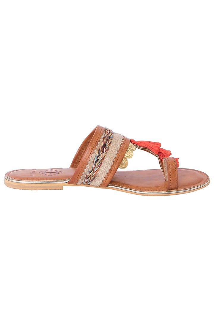 Tan tassel sandals available only at Pernia's Pop Up Shop.