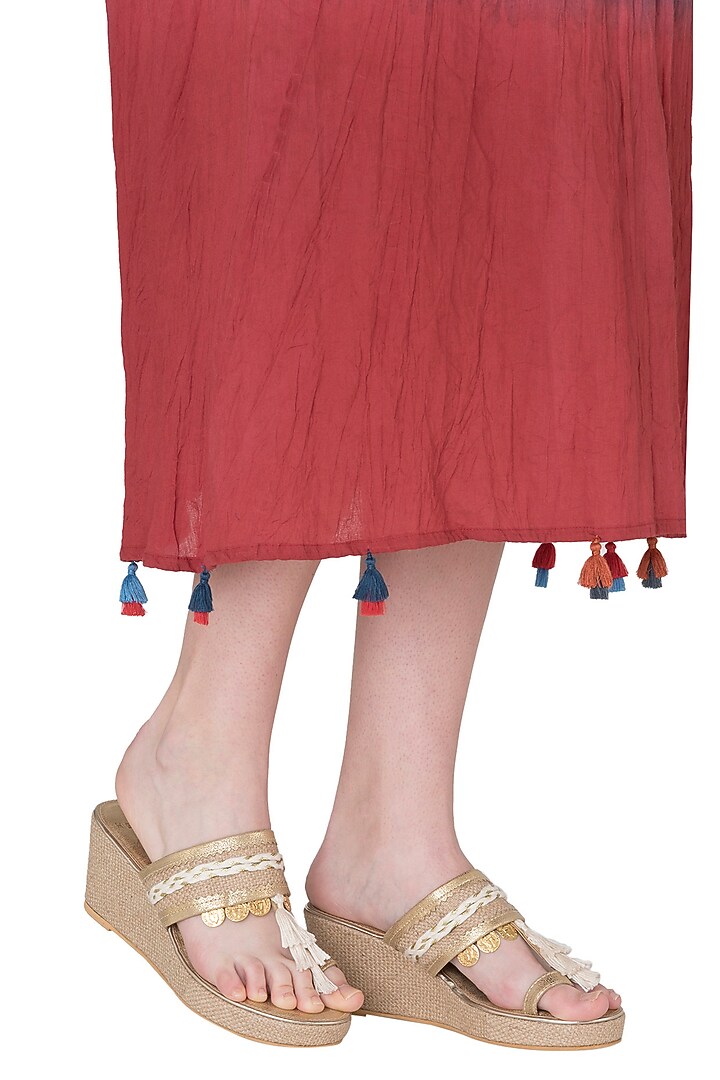 Gold tassel wedge heels available only at Pernia's Pop Up Shop.