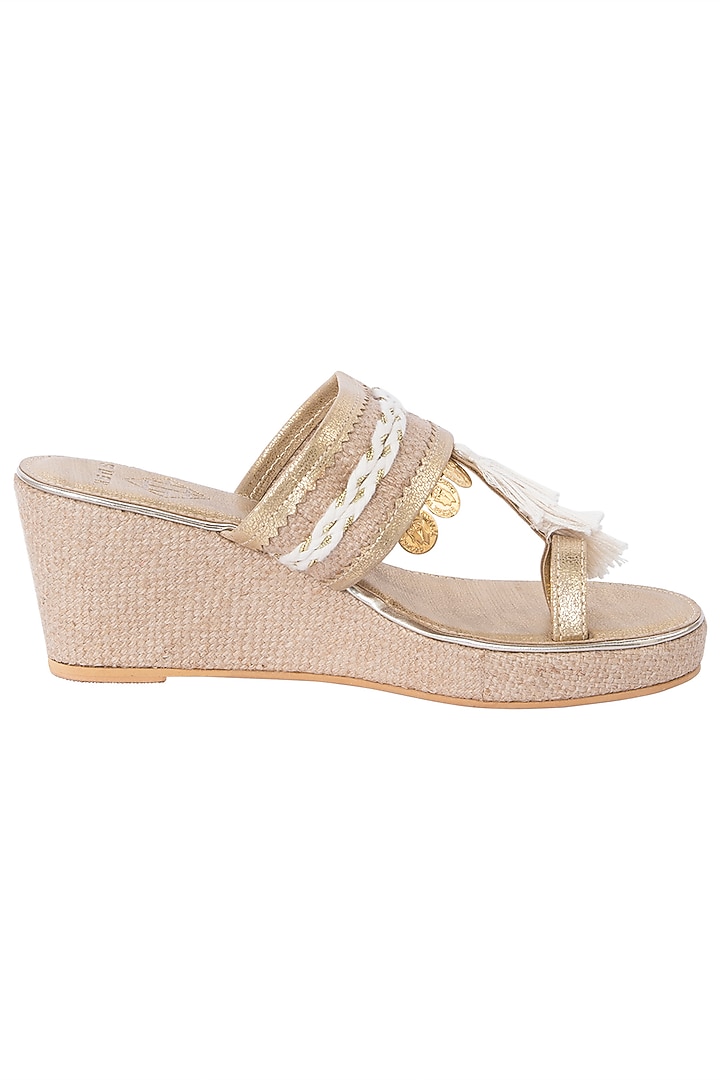 Gold tassel wedge heels available only at Pernia's Pop Up Shop.