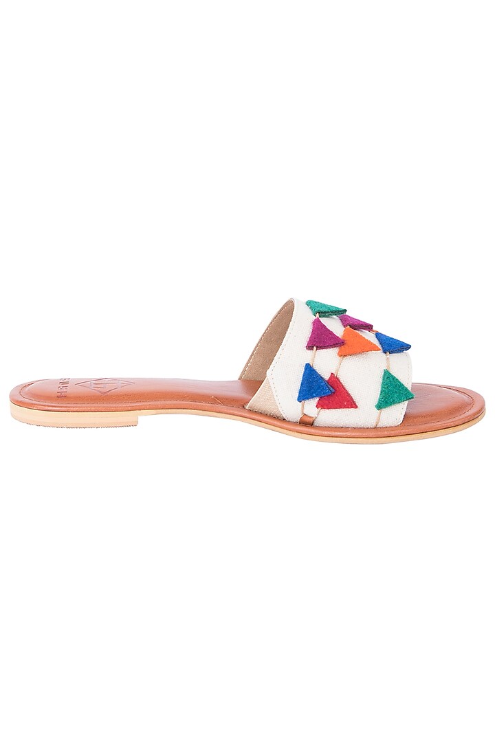 Tan and white layered sliders available only at Pernia's Pop Up Shop.