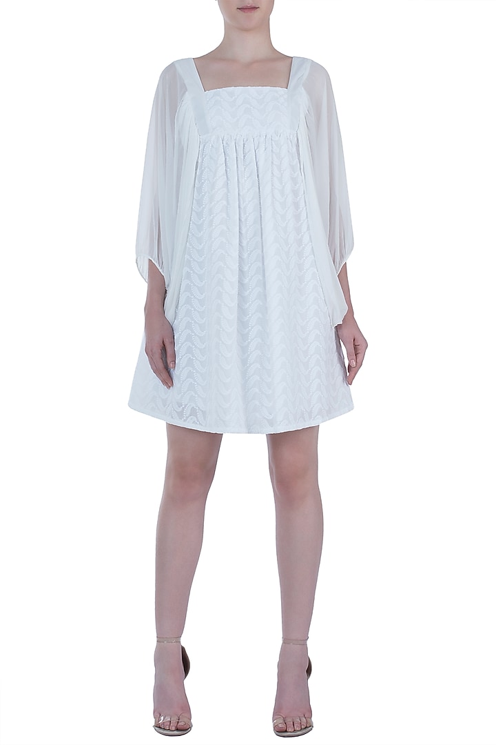 Ivory chikankari smock dress available only at Pernia's Pop Up Shop.