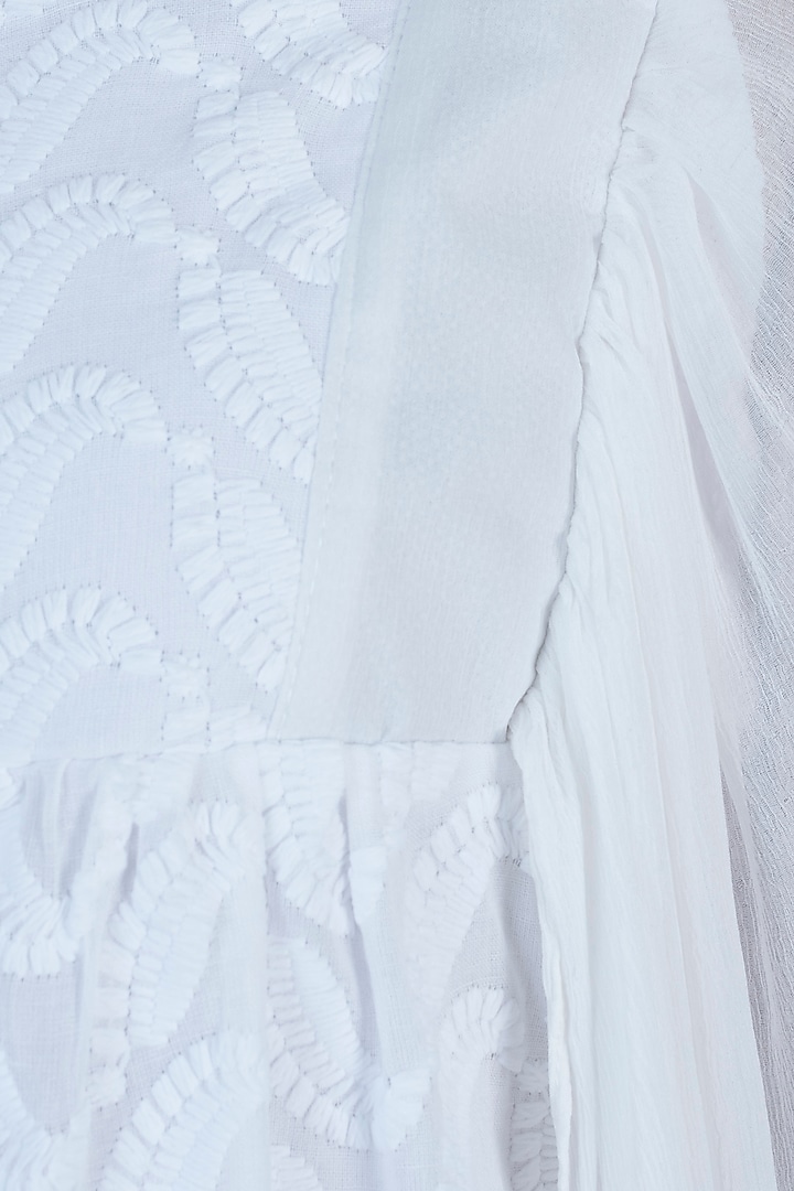 Ivory chikankari smock dress available only at Pernia's Pop Up Shop.