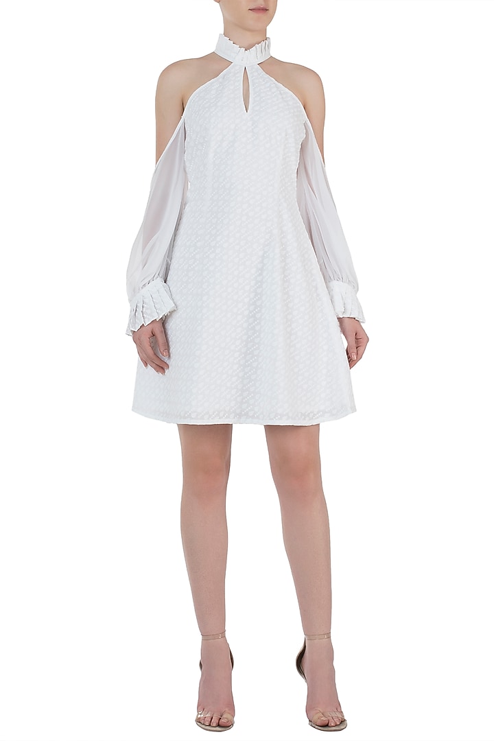 Ivory chikankari ruffle dress available only at Pernia's Pop Up Shop.