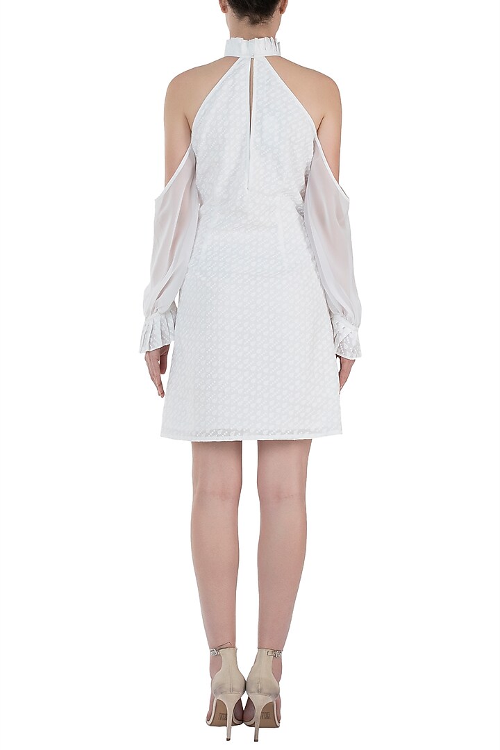 Ivory chikankari ruffle dress available only at Pernia's Pop Up Shop.