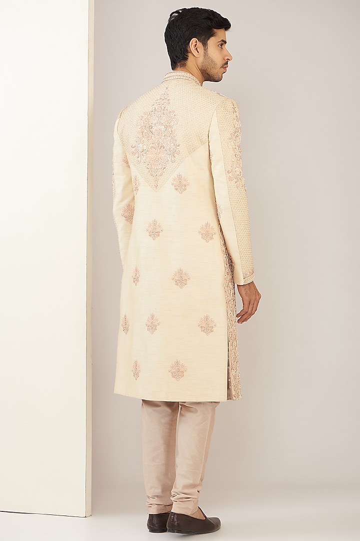 Creamish Light Rose Pink Silk Groom Sherwani Set by GUJRALS at Pernia's Pop Up Shop