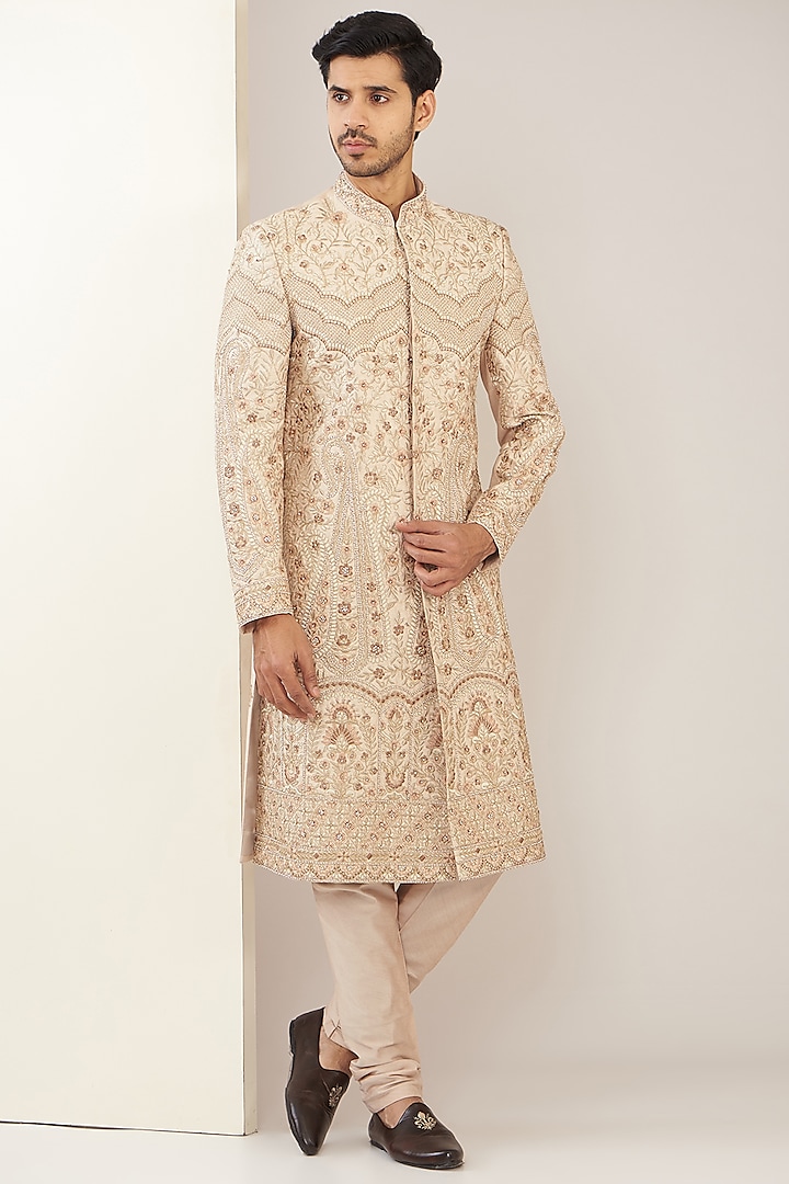 Fawnish Pink Silk Embroidered Sherwani Set by GUJRALS