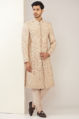 Fawnish Pink Silk Embroidered Sherwani Set by GUJRALS