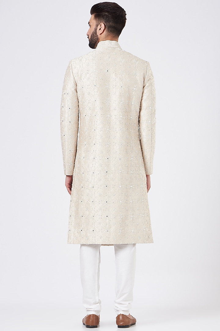 Pearl White Raw Silk Wedding Sherwani Set by GUJRALS at Pernia's Pop Up Shop