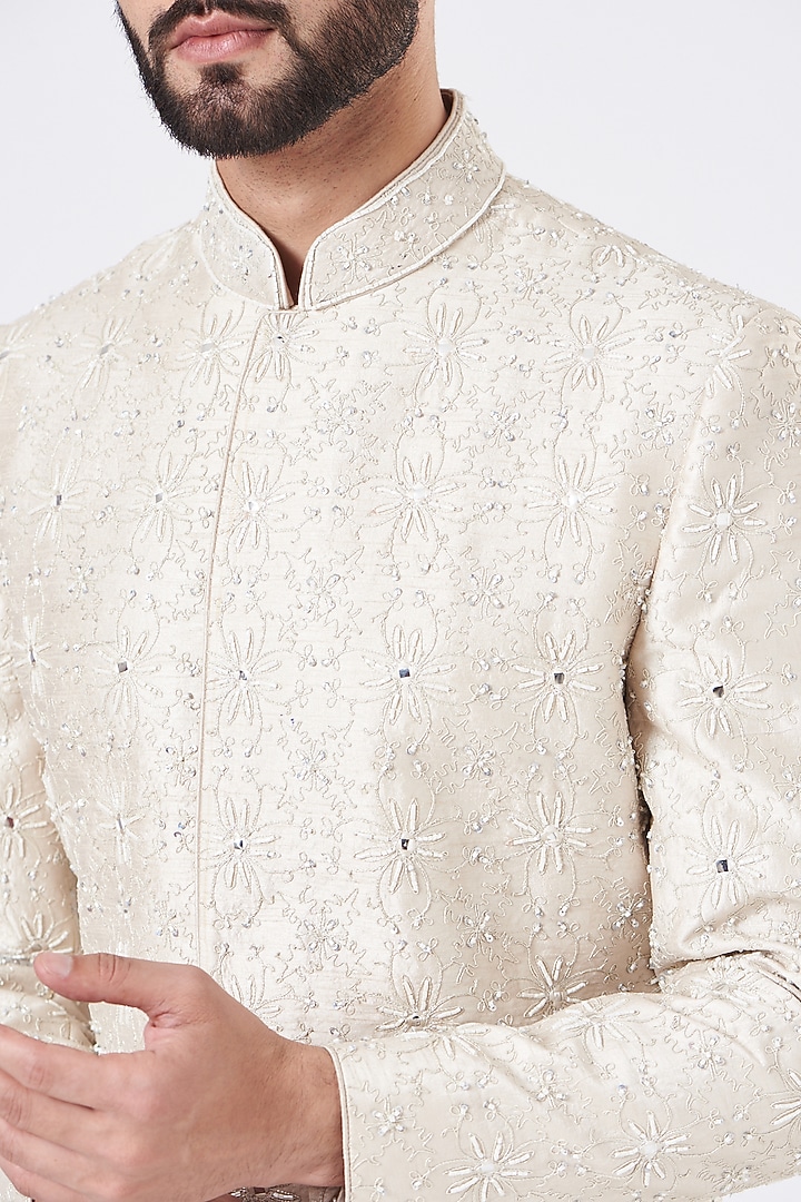 Pearl White Raw Silk Wedding Sherwani Set by GUJRALS at Pernia's Pop Up Shop