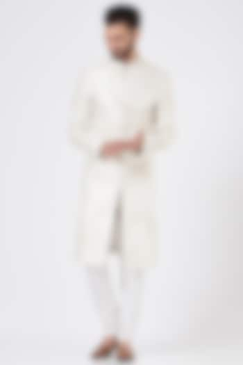 Ivory Silk Embroidered Sherwani Set by GUJRALS