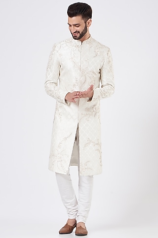 Ivory Silk Embroidered Sherwani Set by GUJRALS
