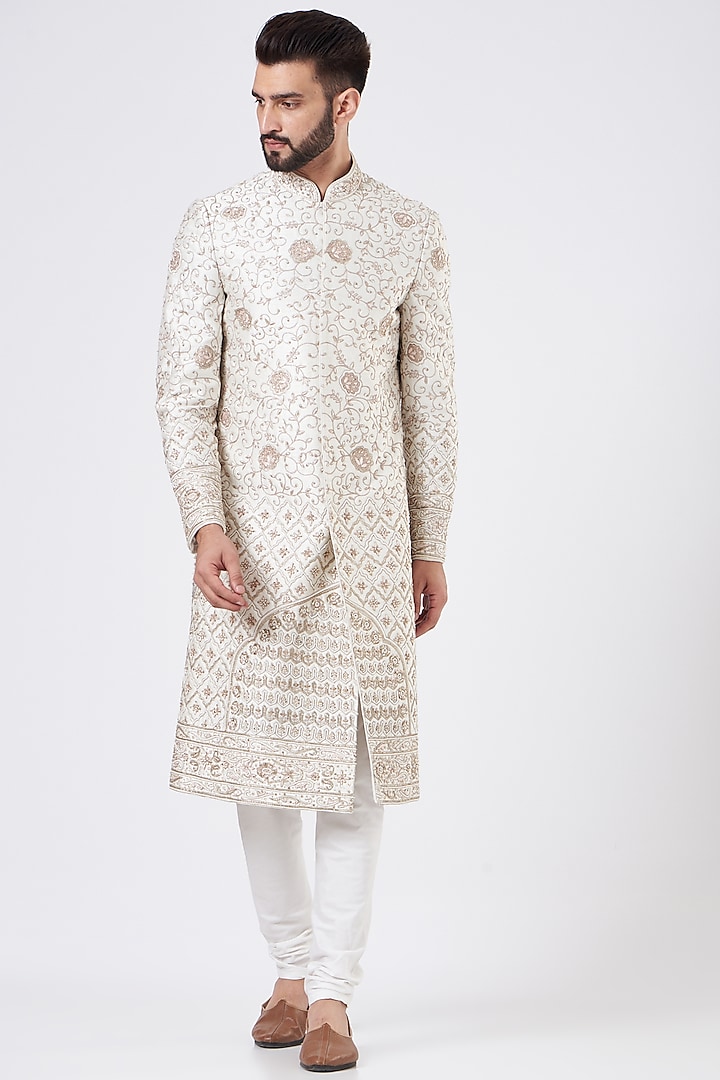 Ivory Velvet Embroidered Sherwani Set by GUJRALS