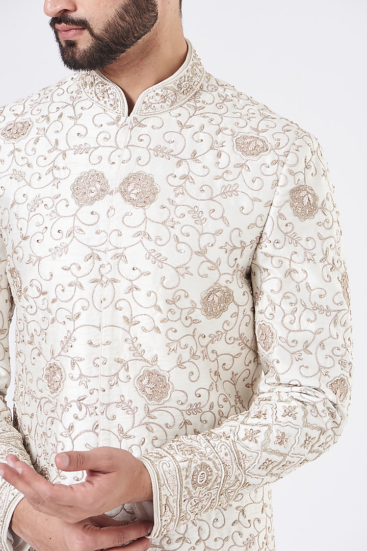Ivory Velvet Embroidered Groom Sherwani Set by GUJRALS at Pernia's Pop Up Shop