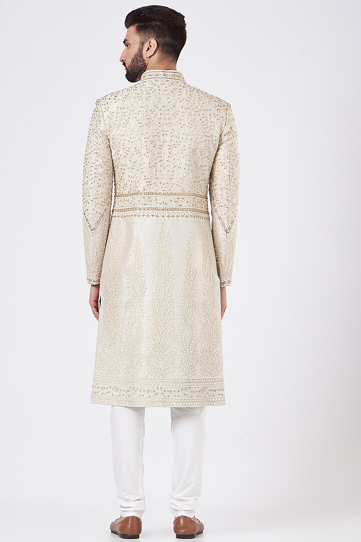 Beige Silk Hand Embroidered Groom Sherwani Set by GUJRALS at Pernia's Pop Up Shop