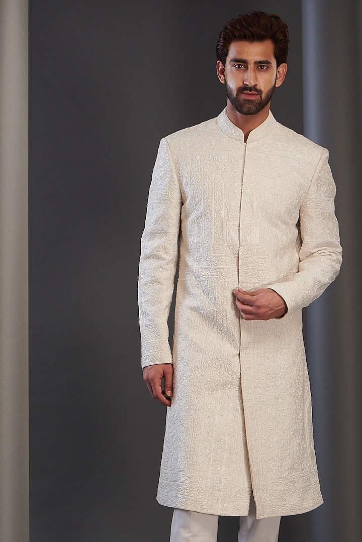 Ivory Raw Silk Embroidered Groom Sherwani by GUJRALS at Pernia's Pop Up Shop