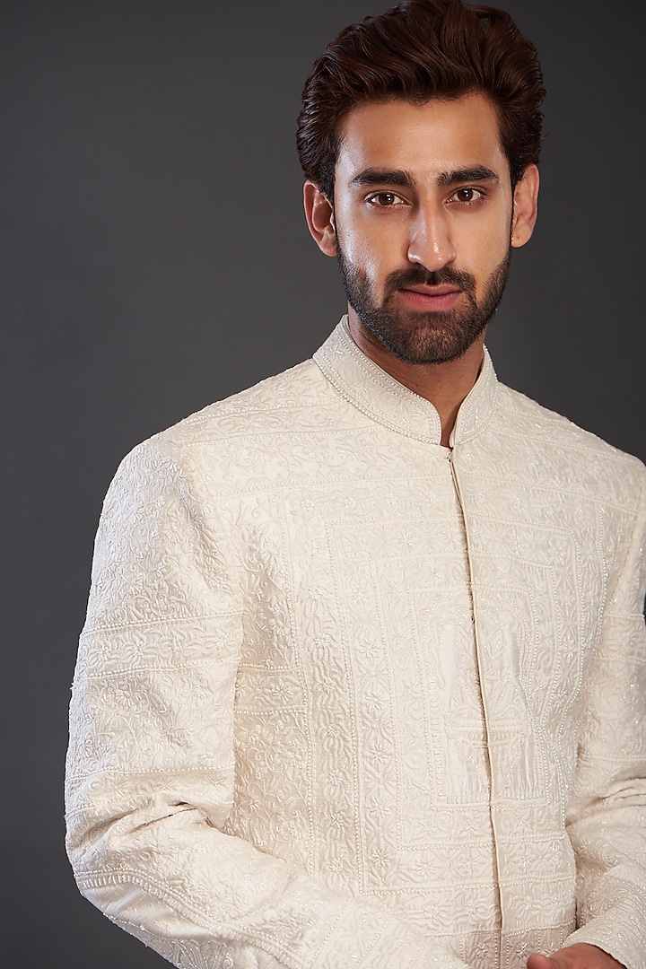 Ivory Raw Silk Embroidered Groom Sherwani by GUJRALS at Pernia's Pop Up Shop