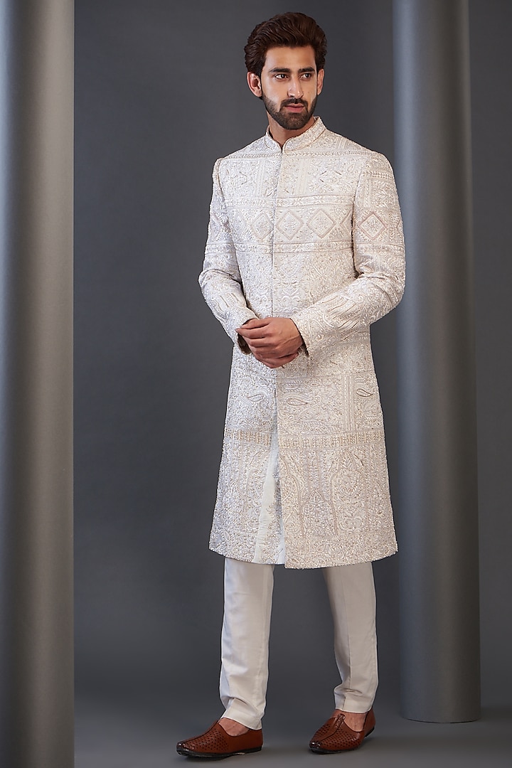 Ivory Raw Silk Embroidered Sherwani by GUJRALS