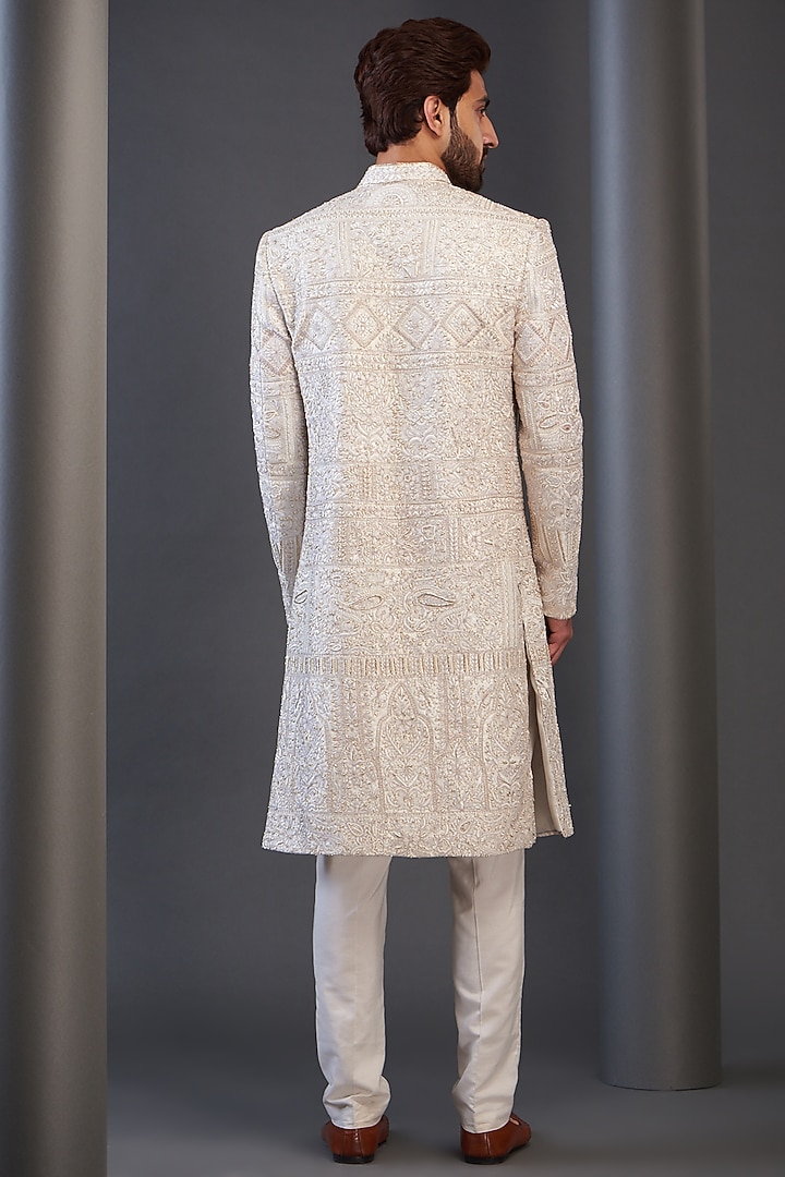 Ivory Raw Silk Embroidered Groom Sherwani by GUJRALS at Pernia's Pop Up Shop