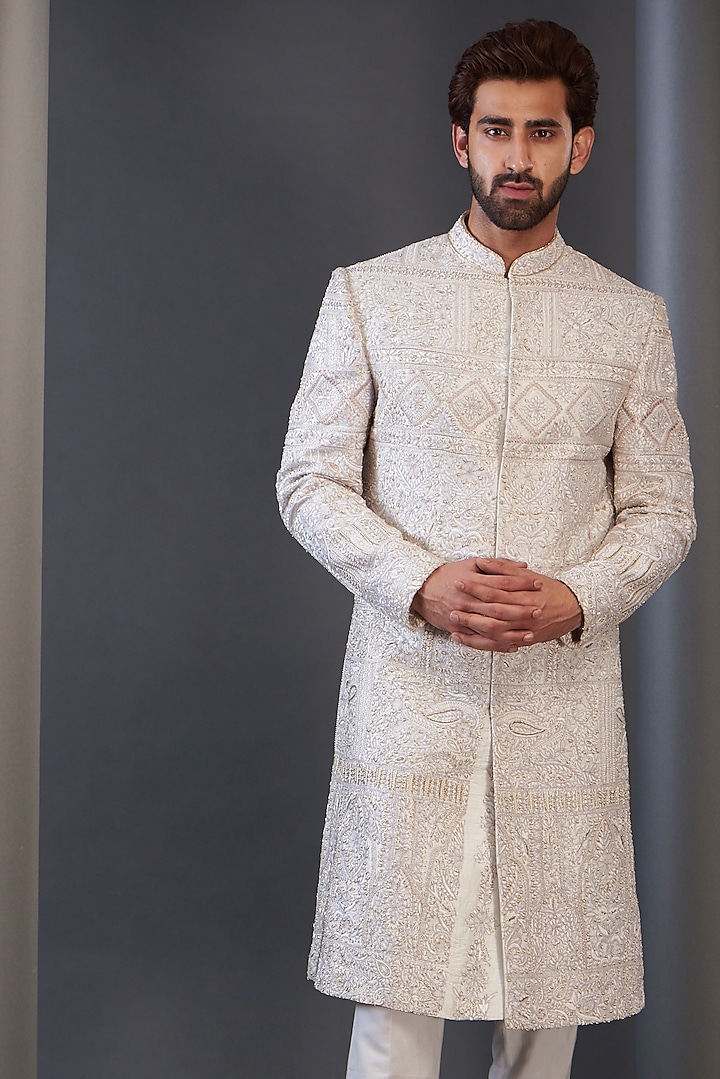 Ivory Raw Silk Embroidered Groom Sherwani by GUJRALS at Pernia's Pop Up Shop