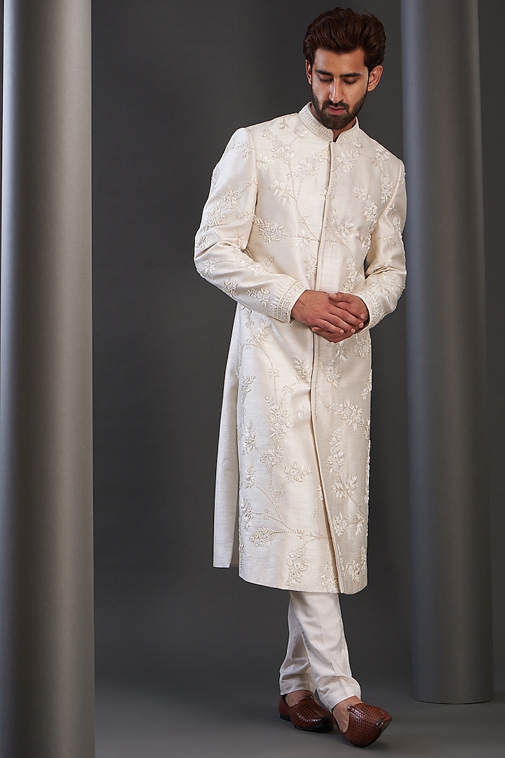 Ivory Silk Hand Embroidered Sherwani by GUJRALS