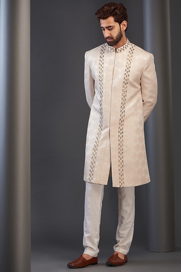 Cream Rayon Embroidered Sherwani by GUJRALS
