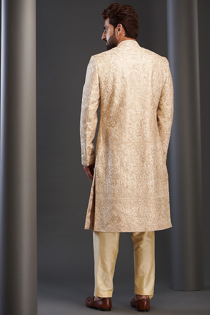 Gold Silk Embroidered Groom Sherwani by GUJRALS at Pernia's Pop Up Shop