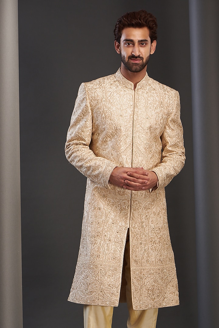 Gold Silk Embroidered Groom Sherwani by GUJRALS at Pernia's Pop Up Shop