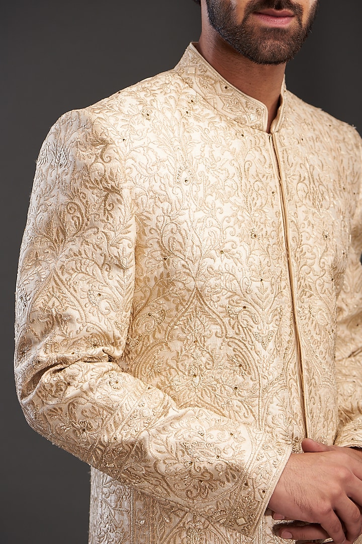 Gold Silk Embroidered Groom Sherwani by GUJRALS at Pernia's Pop Up Shop