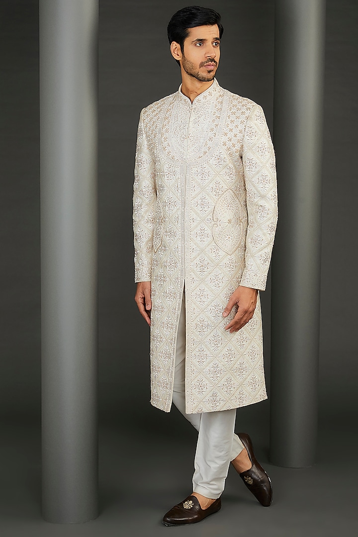 Ivory Silk Embroidered Sherwani Set by GUJRALS