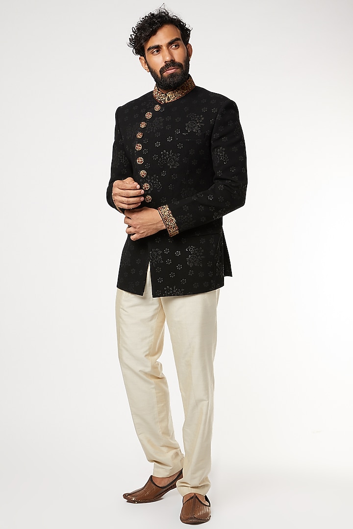 Black Hand Embroidered Asymmetrical Embossed Suit Set by GUJRALS