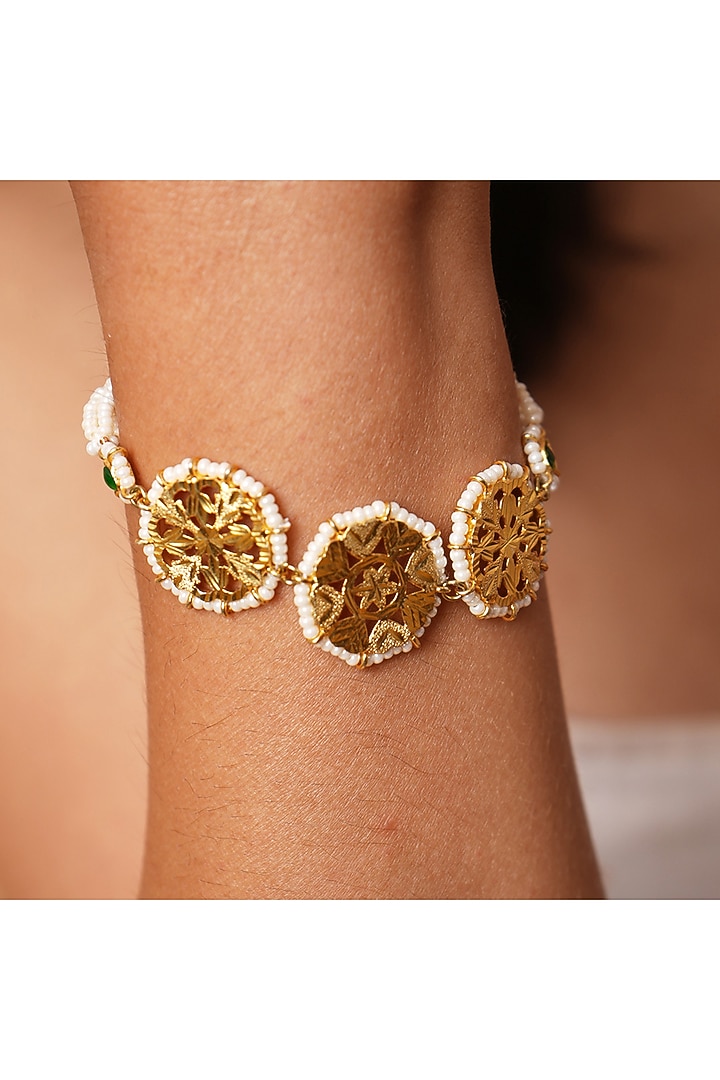 Gold Finish Pearl & Pathra Work Triple Circle Bracelet In Sterling Silver by Gulaal Jewels at Pernia's Pop Up Shop