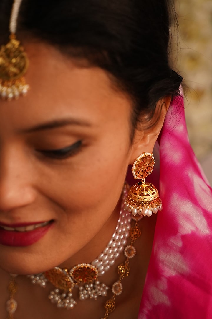 Gold Finish Jhumka Earrings In Sterling Silver by Gulaal Jewels